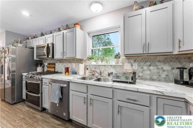 Welcome to this expansive 4-bedroom, 2.5-bath colonial offering on Pocono Farms Country Club in Pennsylvania - for sale on GolfHomes.com, golf home, golf lot