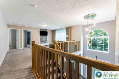 Welcome to this expansive 4-bedroom, 2.5-bath colonial offering on Pocono Farms Country Club in Pennsylvania - for sale on GolfHomes.com, golf home, golf lot
