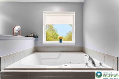 Welcome to this expansive 4-bedroom, 2.5-bath colonial offering on Pocono Farms Country Club in Pennsylvania - for sale on GolfHomes.com, golf home, golf lot