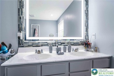 Welcome to this expansive 4-bedroom, 2.5-bath colonial offering on Pocono Farms Country Club in Pennsylvania - for sale on GolfHomes.com, golf home, golf lot