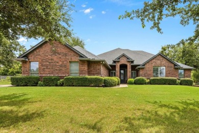 A unique, very large .52 acre lot combined with an updated on Pecan Plantation Country Club in Texas - for sale on GolfHomes.com, golf home, golf lot