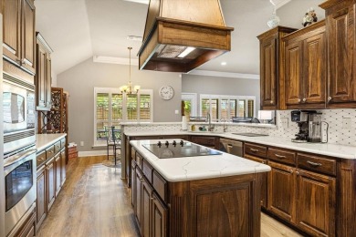 A unique, very large .52 acre lot combined with an updated on Pecan Plantation Country Club in Texas - for sale on GolfHomes.com, golf home, golf lot
