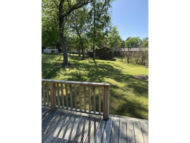 This cozy 3 bed 1.5 bath home is in a quiet neighborhood on a on Russellville Country Club in Arkansas - for sale on GolfHomes.com, golf home, golf lot