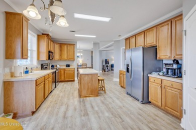 Welcome to your perfect waterfront retreat! This 3-bedroom on The Bridges Golf Club At Hollywood Casino in Mississippi - for sale on GolfHomes.com, golf home, golf lot