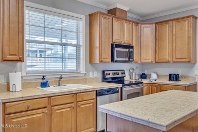 Welcome to your perfect waterfront retreat! This 3-bedroom on The Bridges Golf Club At Hollywood Casino in Mississippi - for sale on GolfHomes.com, golf home, golf lot