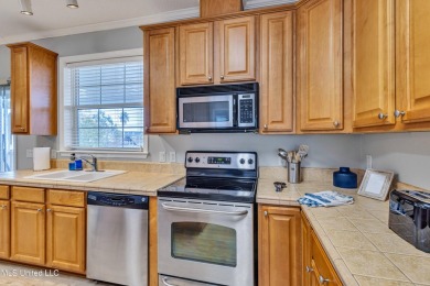 Welcome to your perfect waterfront retreat! This 3-bedroom on The Bridges Golf Club At Hollywood Casino in Mississippi - for sale on GolfHomes.com, golf home, golf lot