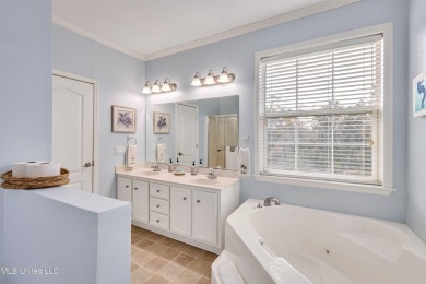 Welcome to your perfect waterfront retreat! This 3-bedroom on The Bridges Golf Club At Hollywood Casino in Mississippi - for sale on GolfHomes.com, golf home, golf lot