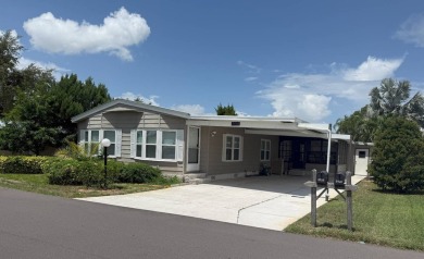 Welcome to your slice of paradise in the highly sought-after on Crystal Lake Club in Florida - for sale on GolfHomes.com, golf home, golf lot