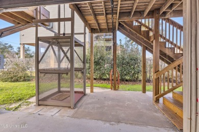 Welcome to your perfect waterfront retreat! This 3-bedroom on The Bridges Golf Club At Hollywood Casino in Mississippi - for sale on GolfHomes.com, golf home, golf lot