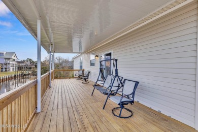 Welcome to your perfect waterfront retreat! This 3-bedroom on The Bridges Golf Club At Hollywood Casino in Mississippi - for sale on GolfHomes.com, golf home, golf lot