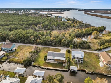 Welcome to your perfect waterfront retreat! This 3-bedroom on The Bridges Golf Club At Hollywood Casino in Mississippi - for sale on GolfHomes.com, golf home, golf lot