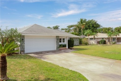 Stately home with grey stone trim.  Very well maintained on on Whiskey Creek Country Club in Florida - for sale on GolfHomes.com, golf home, golf lot