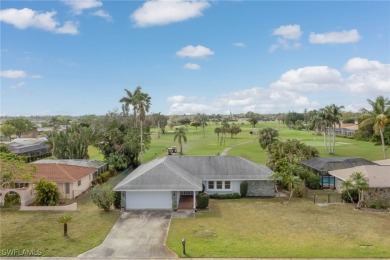 Stately home with grey stone trim.  Very well maintained on on Whiskey Creek Country Club in Florida - for sale on GolfHomes.com, golf home, golf lot