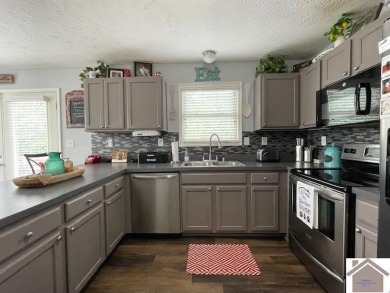 The TOTAL Package! Beautiful Home with attached garage and on Boots Randolph Golf Course in Kentucky - for sale on GolfHomes.com, golf home, golf lot