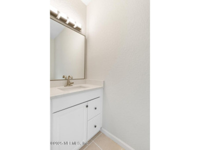 Discover coastal living at its finest with this 3-bedroom, 2 on Selva Marina Country Club in Florida - for sale on GolfHomes.com, golf home, golf lot