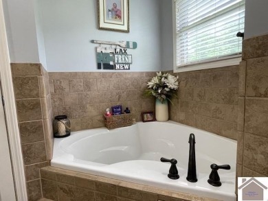 The TOTAL Package! Beautiful Home with attached garage and on Boots Randolph Golf Course in Kentucky - for sale on GolfHomes.com, golf home, golf lot