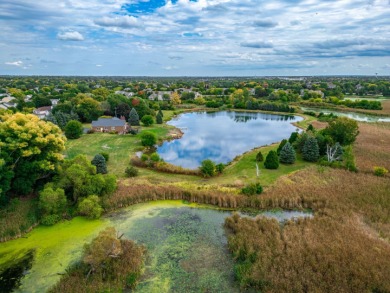 Discover nearly 32 acres of natural beauty and privacy on Boulder Ridge Country Club in Illinois - for sale on GolfHomes.com, golf home, golf lot