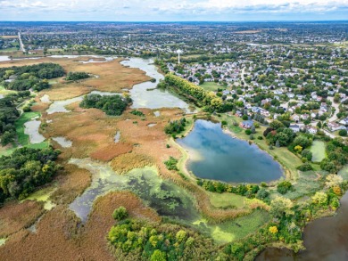 Discover nearly 32 acres of natural beauty and privacy on Boulder Ridge Country Club in Illinois - for sale on GolfHomes.com, golf home, golf lot