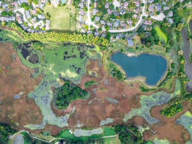 Discover nearly 32 acres of natural beauty and privacy on Boulder Ridge Country Club in Illinois - for sale on GolfHomes.com, golf home, golf lot