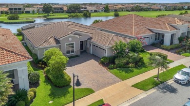 EXQUISITE WATERFRONT GOLF COURSE POOL HOME IN EAGLE CREEK -- on Eagle Creek Golf Club in Florida - for sale on GolfHomes.com, golf home, golf lot