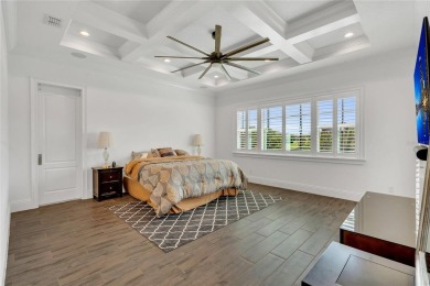 EXQUISITE WATERFRONT GOLF COURSE POOL HOME IN EAGLE CREEK -- on Eagle Creek Golf Club in Florida - for sale on GolfHomes.com, golf home, golf lot