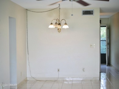 This charming 2-bedroom, 2-bathroom apartment offers a fantastic on Daytona Beach Golf Club in Florida - for sale on GolfHomes.com, golf home, golf lot