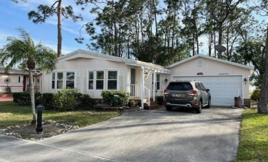 This thoughtfully designed split-floor plan offers privacy on Del Tura Golf and Country Club in Florida - for sale on GolfHomes.com, golf home, golf lot
