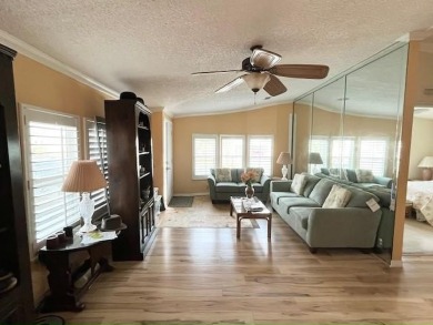 This thoughtfully designed split-floor plan offers privacy on Del Tura Golf and Country Club in Florida - for sale on GolfHomes.com, golf home, golf lot
