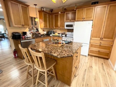 This thoughtfully designed split-floor plan offers privacy on Del Tura Golf and Country Club in Florida - for sale on GolfHomes.com, golf home, golf lot