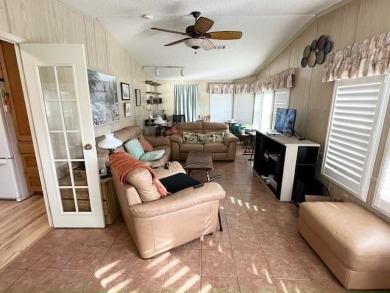 This thoughtfully designed split-floor plan offers privacy on Del Tura Golf and Country Club in Florida - for sale on GolfHomes.com, golf home, golf lot