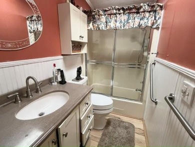 This thoughtfully designed split-floor plan offers privacy on Del Tura Golf and Country Club in Florida - for sale on GolfHomes.com, golf home, golf lot
