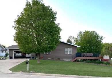 This gorgeous ranch style home with double attached garage sits on Holstein Country Club in Iowa - for sale on GolfHomes.com, golf home, golf lot