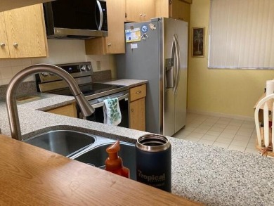 THIS 2BDRM/2BATH UNIT HAS DIRECT GOLF VIEWS OFF BOTH SLIDING on Bear Lakes Country Club in Florida - for sale on GolfHomes.com, golf home, golf lot