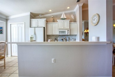 Top-Floor Veranda with Spectacular Golf & Lake Views. Relax and on Heritage Palms Golf and Country Club in Florida - for sale on GolfHomes.com, golf home, golf lot