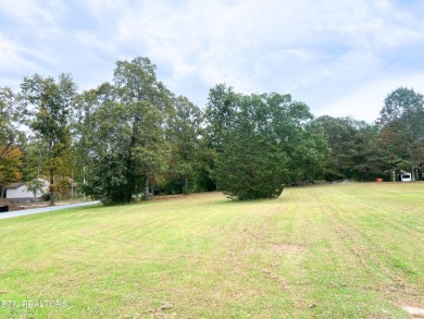 Water view! Nearly an acre total in these two gorgeous, cleared on Lake Tansi Village Country Club in Tennessee - for sale on GolfHomes.com, golf home, golf lot