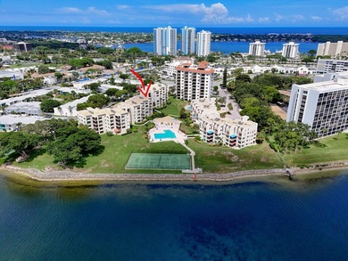 Spacious 2000+ sq. ft. corner unit overlooking the intracoastal on North Palm Beach Country Club in Florida - for sale on GolfHomes.com, golf home, golf lot