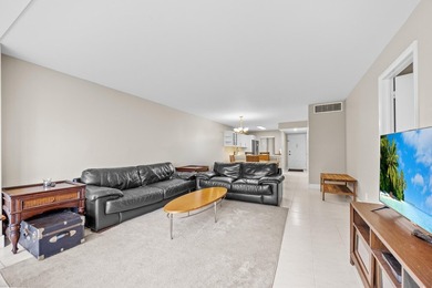 Wake up to tranquil lake and golf course views in this on Fountains Golf and Country Club in Florida - for sale on GolfHomes.com, golf home, golf lot