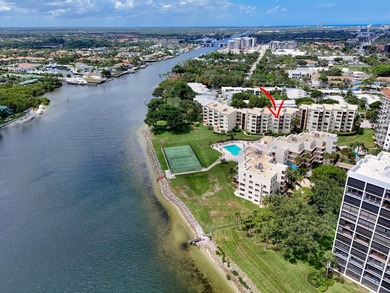 Spacious 2000+ sq. ft. corner unit overlooking the intracoastal on North Palm Beach Country Club in Florida - for sale on GolfHomes.com, golf home, golf lot