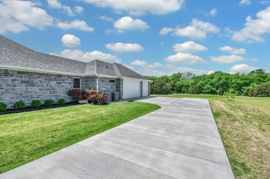 NEW IMPROVED PRICE on this breathtaking 2022 custom-built home on White Bluff Resort - New Course in Texas - for sale on GolfHomes.com, golf home, golf lot
