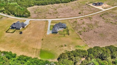 NEW IMPROVED PRICE on this breathtaking 2022 custom-built home on White Bluff Resort - New Course in Texas - for sale on GolfHomes.com, golf home, golf lot
