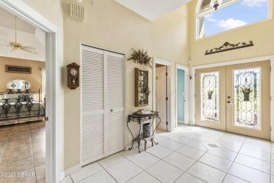 Nestled within the exclusive gates of the Plantation Bay on Plantation Bay Golf and Country Club in Florida - for sale on GolfHomes.com, golf home, golf lot