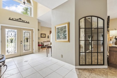 Nestled within the exclusive gates of the Plantation Bay on Plantation Bay Golf and Country Club in Florida - for sale on GolfHomes.com, golf home, golf lot