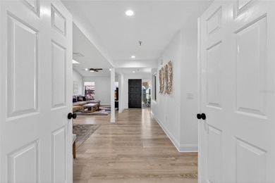 Situated behind gates of the coveted Bay Isles on Longboat Key on Longboat Key Golf Club Resort in Florida - for sale on GolfHomes.com, golf home, golf lot