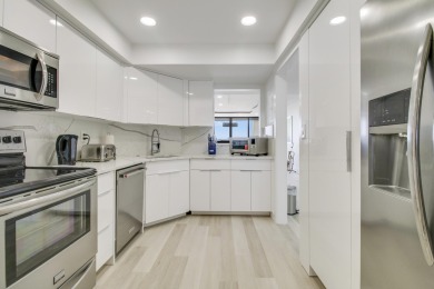 Enjoy breathtaking views from this 2 Bedroom 2 Bath corner unit on The President Country Club in Florida - for sale on GolfHomes.com, golf home, golf lot