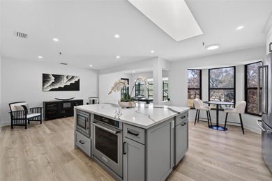 Situated behind gates of the coveted Bay Isles on Longboat Key on Longboat Key Golf Club Resort in Florida - for sale on GolfHomes.com, golf home, golf lot