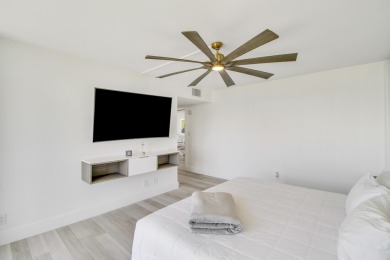 Enjoy breathtaking views from this 2 Bedroom 2 Bath corner unit on The President Country Club in Florida - for sale on GolfHomes.com, golf home, golf lot