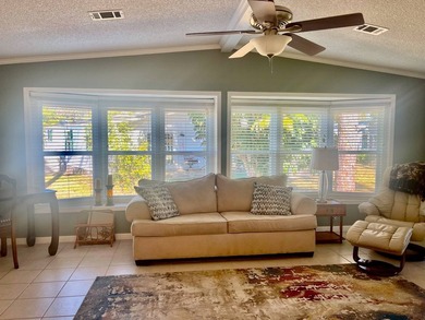 Stunning, move-in-ready manufactured home on leased land-nothing on Pine Lakes Country Club in Florida - for sale on GolfHomes.com, golf home, golf lot