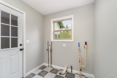 This 3 bedroom, 2 bath ranch backs up to the commons area with a on Sugar Springs Country Club in Michigan - for sale on GolfHomes.com, golf home, golf lot