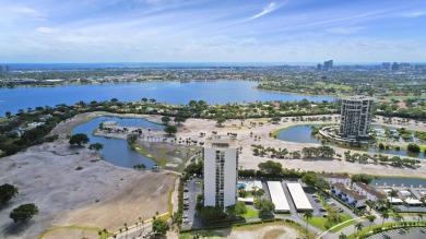 Enjoy breathtaking views from this 2 Bedroom 2 Bath corner unit on The President Country Club in Florida - for sale on GolfHomes.com, golf home, golf lot