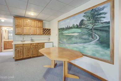 This impressive, full-brick home is locatd on a spacious golf on The Bald Eagle Course At Eagle Creek Golf Club in Missouri - for sale on GolfHomes.com, golf home, golf lot